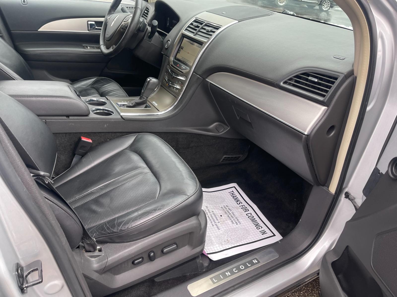 2014 Silver /Black Lincoln MKX Elite AWD (2LMDJ8JK4EB) with an 3.7L V6 DOHC 24V engine, 6-Speed Automatic transmission, located at 547 E. Main St., Orwell, OH, 44076, (440) 437-5893, 41.535435, -80.847855 - This 2014 Lincoln MKX AWD with the Elite Package offers a luxurious and well-appointed driving experience. Under the hood lies a robust 3.7-liter V6 engine mated to a smooth 6-speed transmission, delivering a balance of power and efficiency. Audiophiles will appreciate the premium THX audio system, - Photo #49